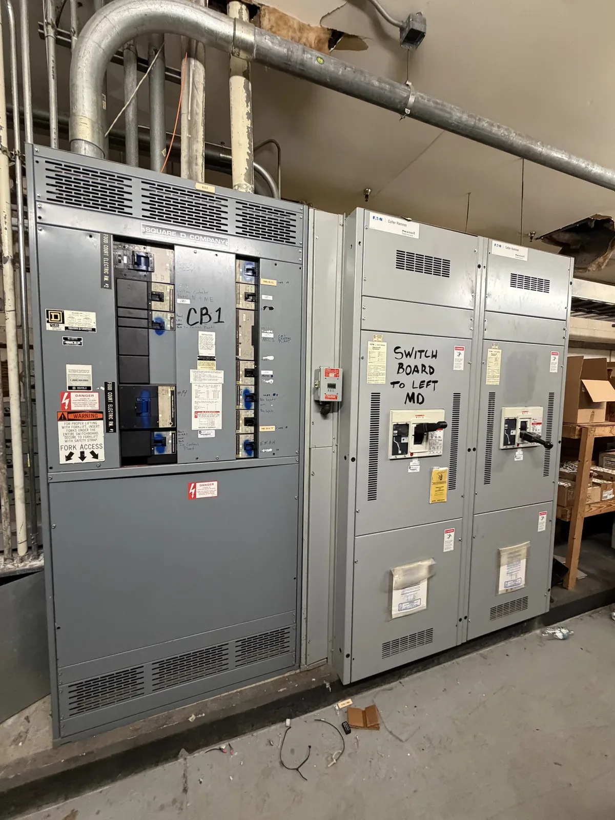 Switchboards inside a plant being cleared out