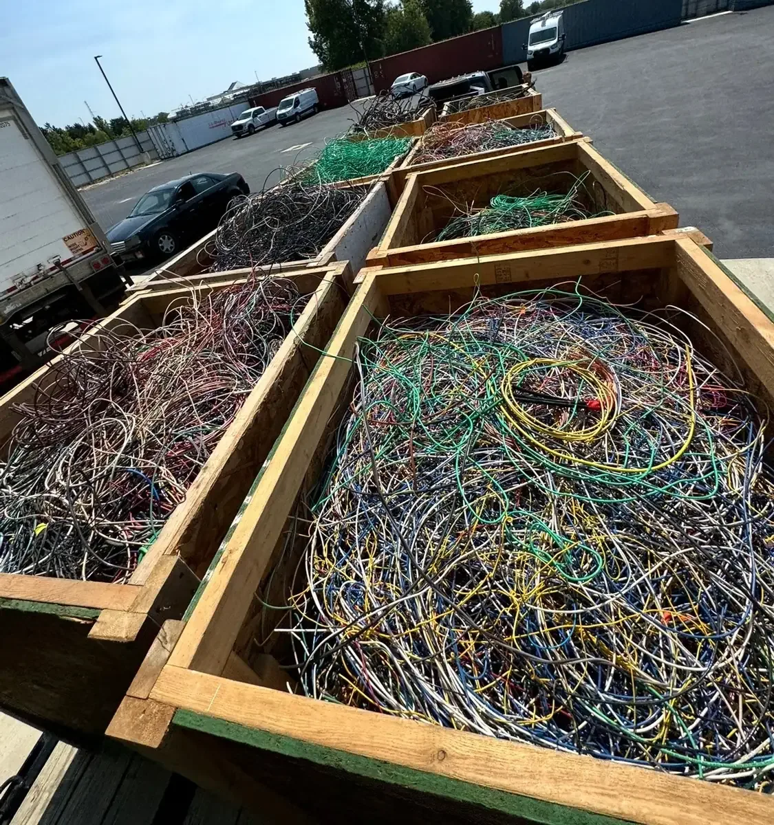 Wooden crates of insulated wire for recycling
