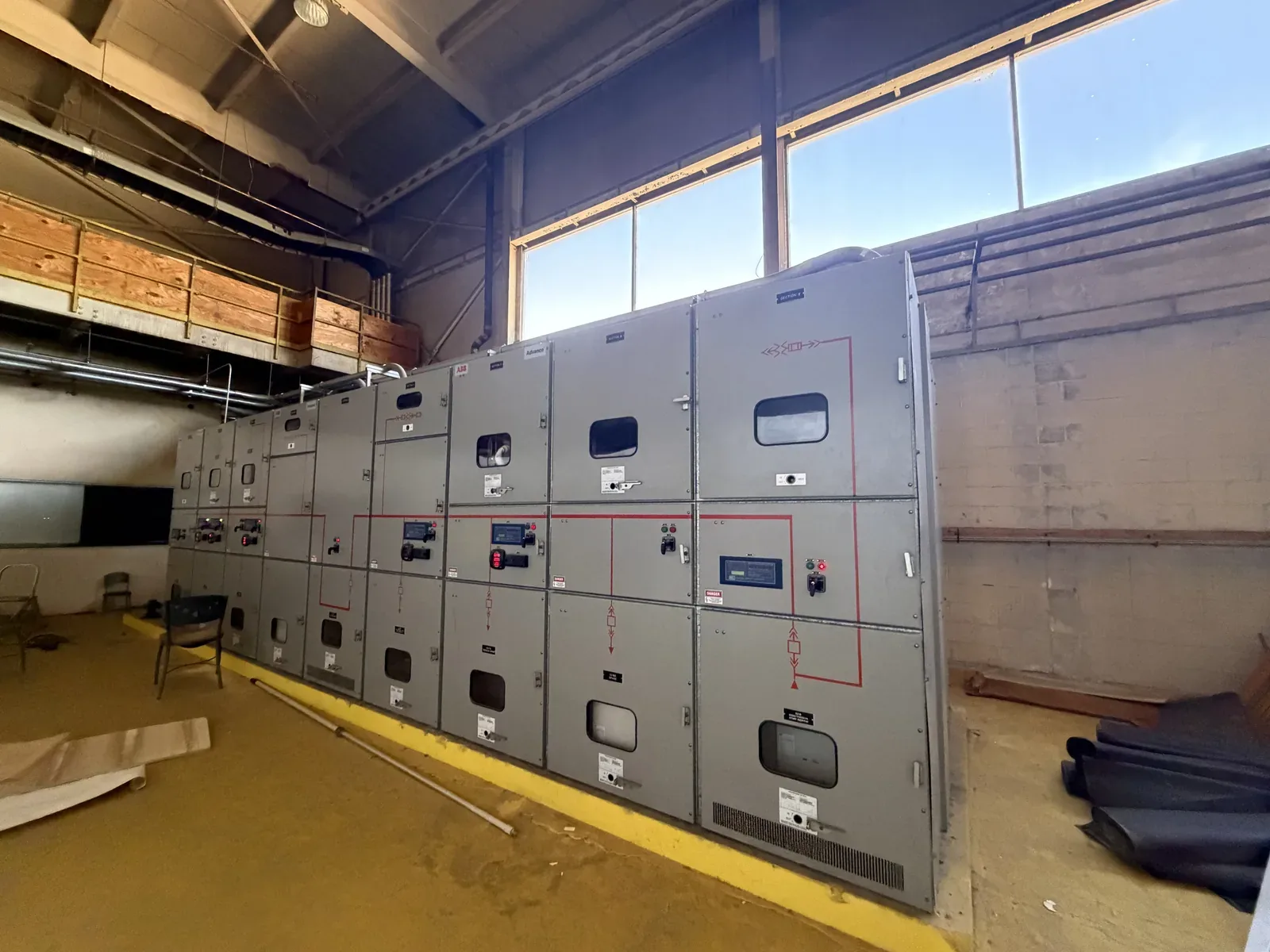 Switchgear lineup inside a plant being cleared out